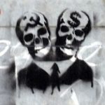 Grafitti of two skulls in a suit